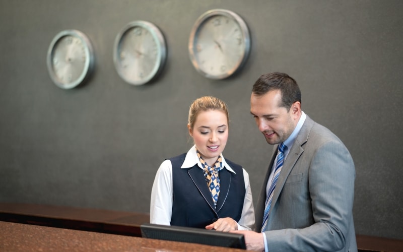 on-site hospitality staffing manager at front desk